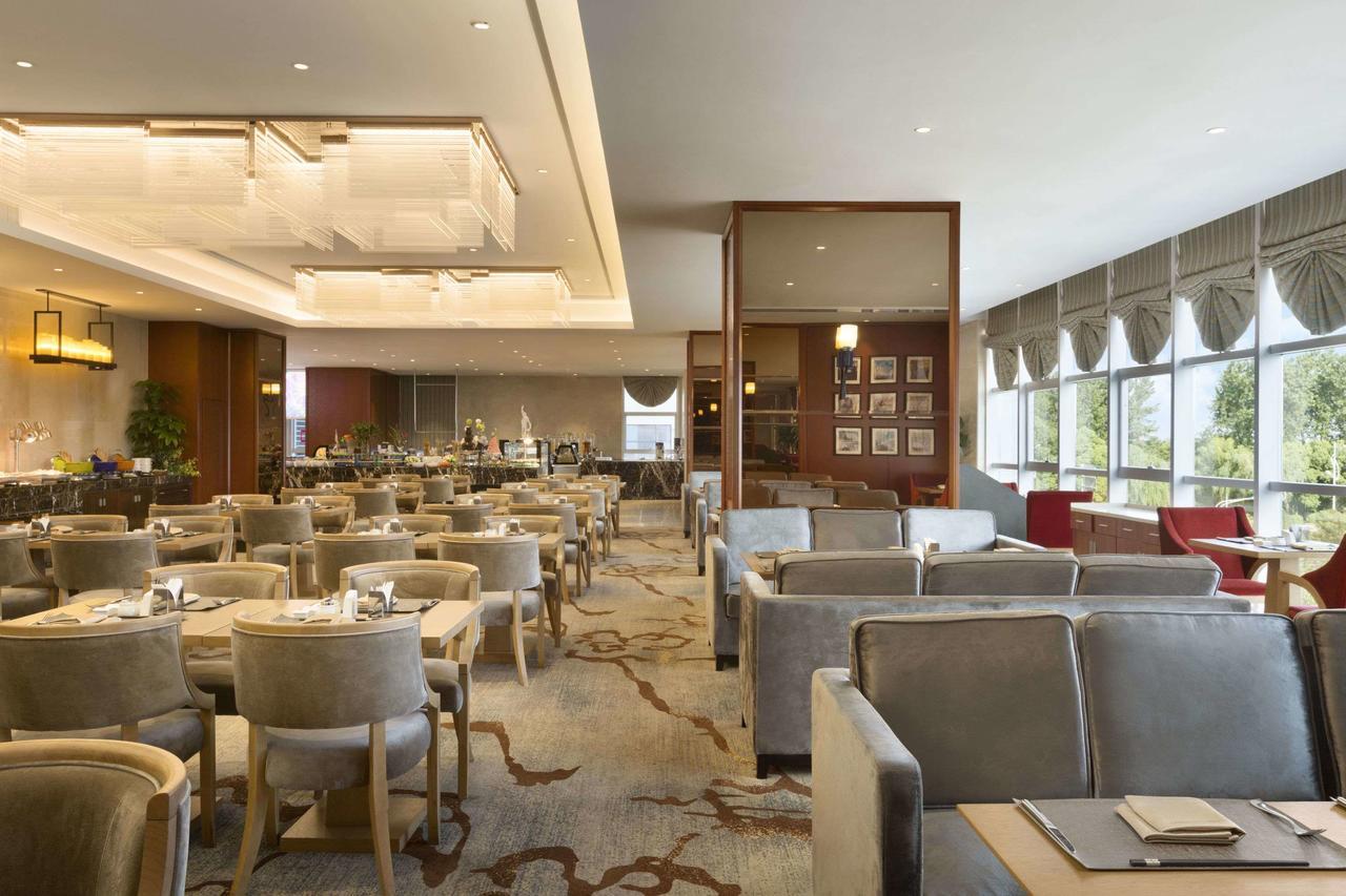 Ramada Jiaxing Hotell Exteriör bild