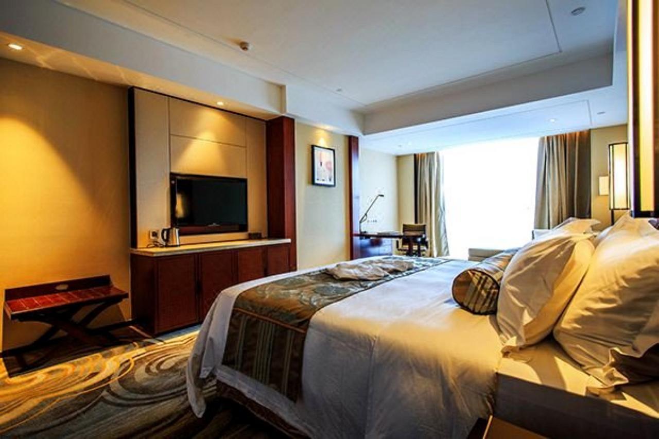 Ramada Jiaxing Hotell Exteriör bild